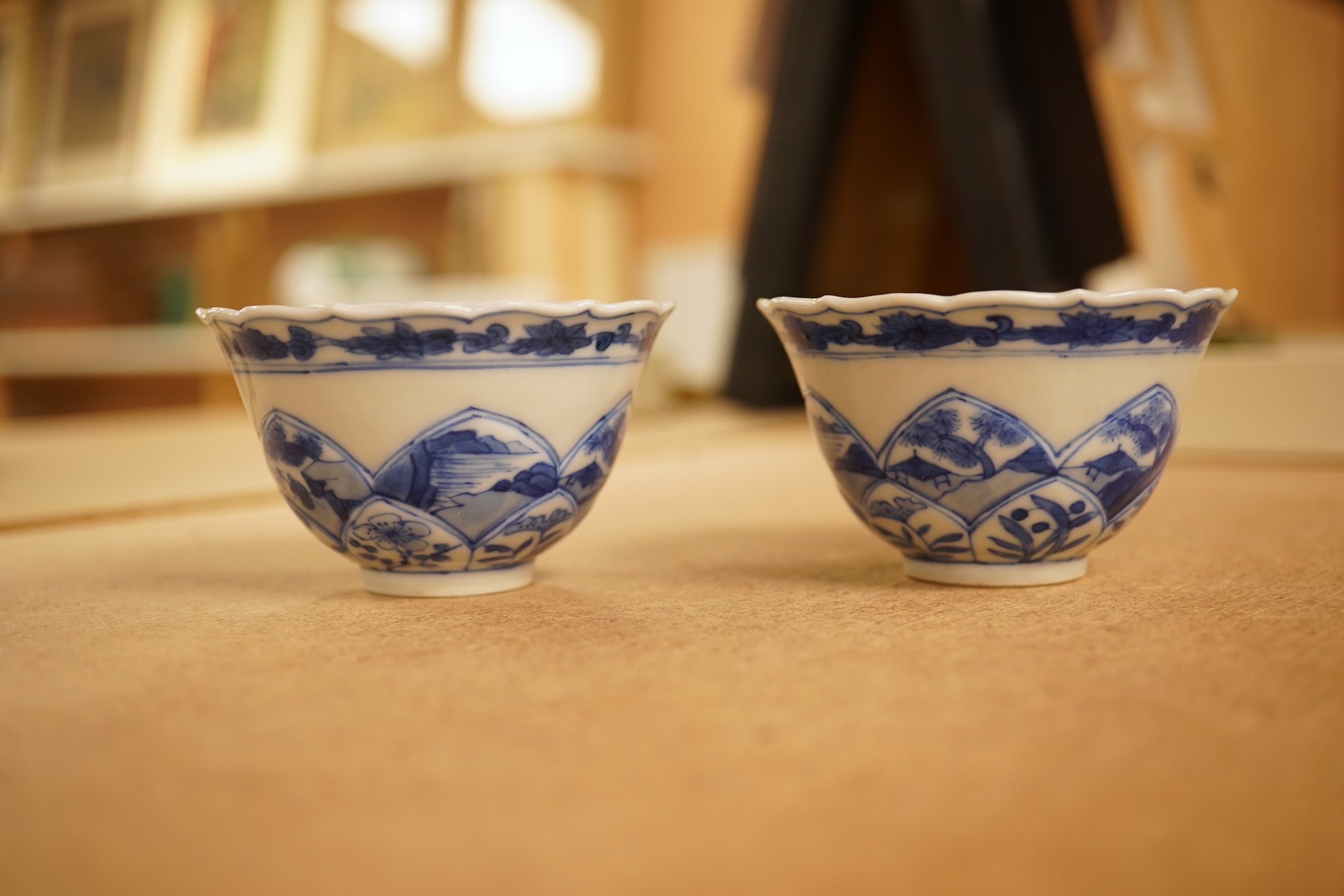 Two Chinese blue and white tea bowls and saucers, saucer 10cm diameter.